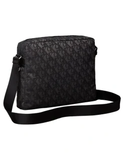 Calvin Klein Unstructured Monogram Flight Bag in Black