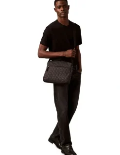 Calvin Klein Unstructured Monogram Flight Bag in Black