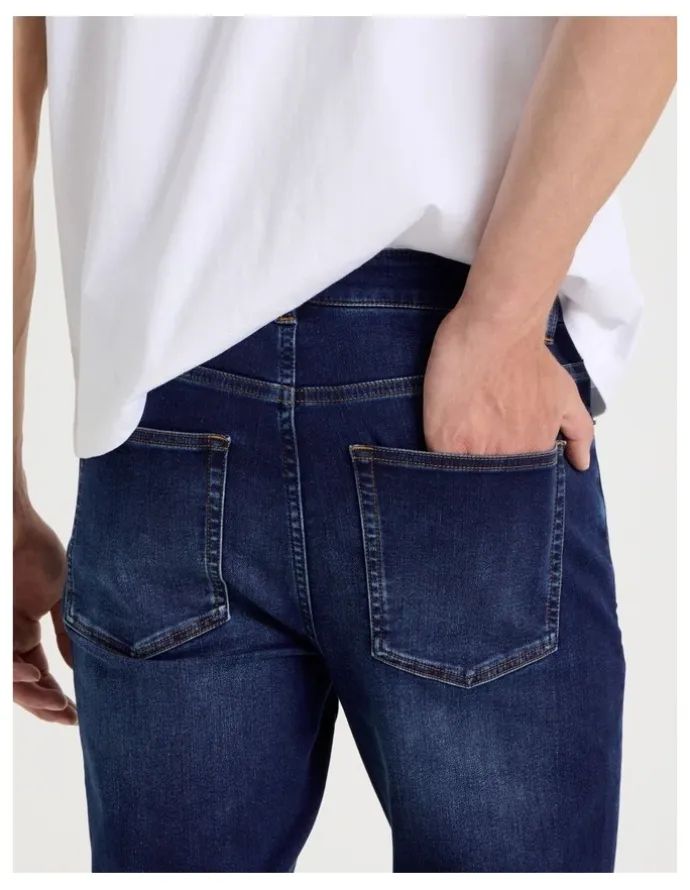 Grab Regular Tapered Knit Jeans in Mid Blues