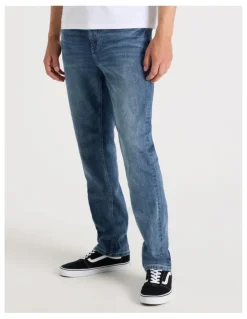 Grab Regular Tapered Tinted Jeans in Mid Blues