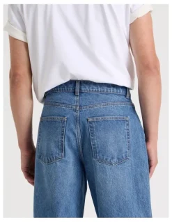 Grab Seam Forward Loose Tinted Jeans in Mid Blues