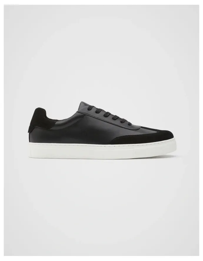 Unison Stockholm Leather Sneaker in Black