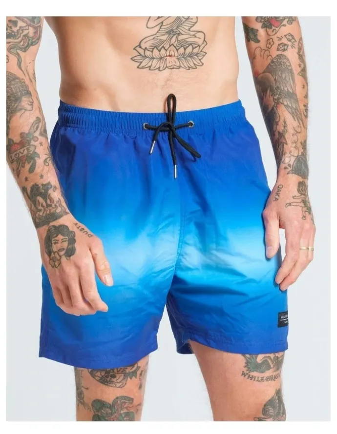 Vacancy Co Ombre Swim Shorts in Blue